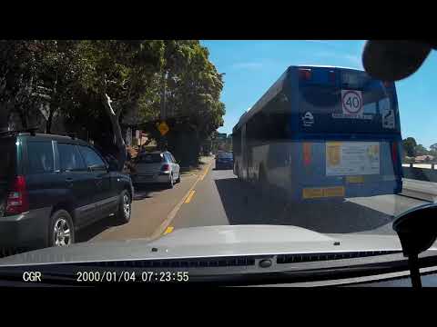 Sydney Bus MO 1282 cutting off car