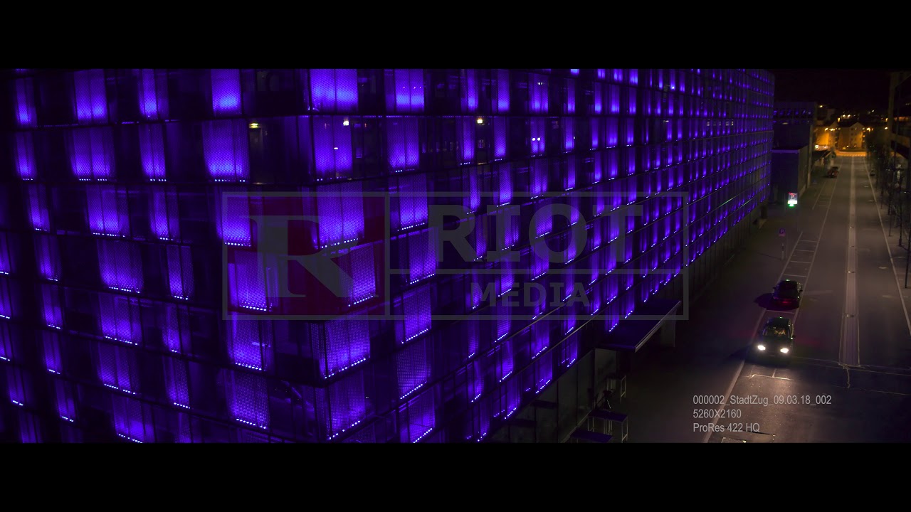 Aerial drone stock video city night parking lot in 6k