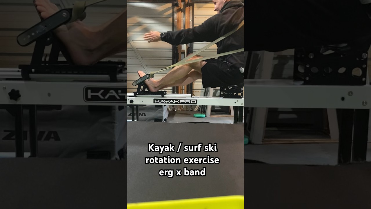 Kayak surf ski rotation exercise on erg with band. www.strongpaddler.com