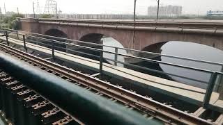 preview picture of video 'Shaky Ride of EMU over Hindon River Ghaziabad'