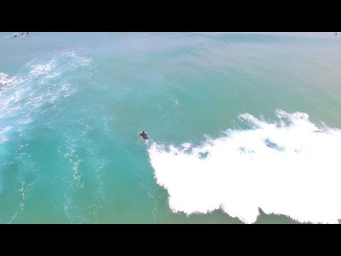 Surfing Gunnamatta with exciting waves