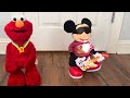 Tickle Me Elmo Extra Special Edition And Rock Star Mickey