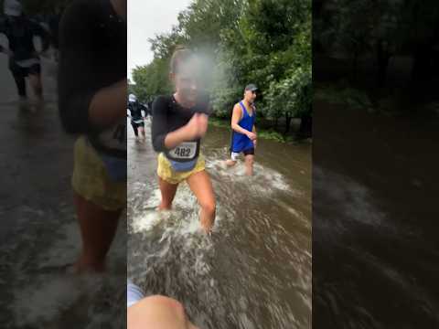 Runners race through flash floods in New Jersey