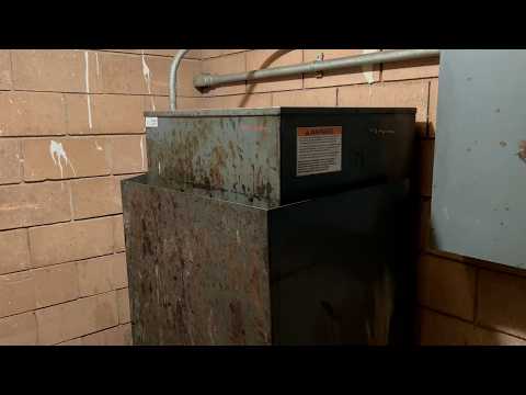 Listening to a San Jose Hydraulic Swing Door Elevator Machine