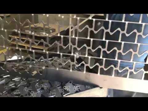 Rhino Hammer removing  .25" thk grade 50 steel parts from the laser cut skeleton