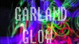 A..TRAVIS GARLAND--GLOW STICK