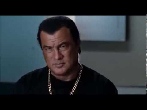 Julianne Moore interrogating Steven Seagal in Driven to Kill