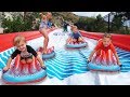 WORLD'S BIGGEST BACKYARD SLIP AND SLIDE! WORLD'S BIGGEST BACKYARD SLIP AND SLIDE!