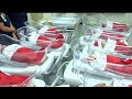 Long Beach Continues Tradition Of Newborns In Stockings