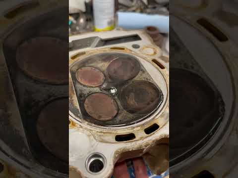 Trick testing to see if valves seal on a grizzly 700 atv, before reassembly.