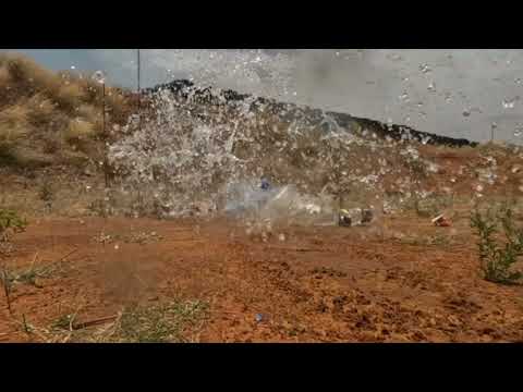 12ga round-ball slug. Water jug penetration test. Full version