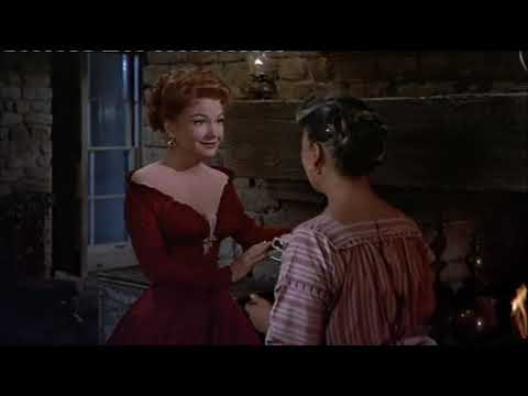 Romile’s Film Dress Porn: Three Violent People  – It’s all about the dress [red evening gown].
