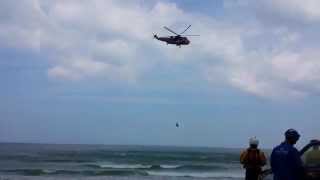 preview picture of video 'HM Coastguard Helicopter bring victim to Trevauance Cove, St Agnes in training excercise'