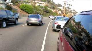 The importance of taking the lane around a blind curve with the presence of parked cars