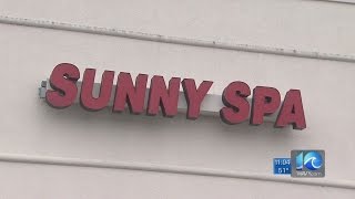 Authorities executing search warrants at several massage parlors in Chesapeake