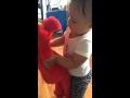 Hugging Elmo