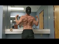 Posing/flexing post back workout men's physique bodybuilding