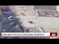 Watch Moment Driver PLOWS Through Gate In High Speed Police Chase In Chicago
