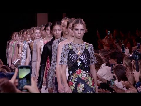 Models and designer on the runway for the Paco Rabanne Fashion Show