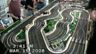 Guys and a couple women playing with slot cars 3-15-08 Heat 4