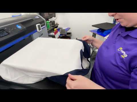 DTG - Loading garments onto the printer for DTG