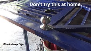 Cutting a round hole in a steel door without a hole-saw.
