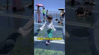 Girl walking on glass bridge impressive!!!
