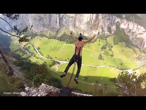 base jumper ties parachute to his back piercings