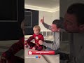 Xavi with his child singing the Barcelona anthem