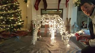 Fixing Christmas lights on a reindeer