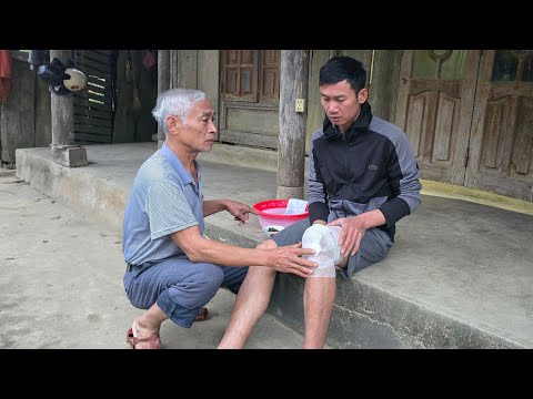Young man in distress in the pouring rain at night, mysterious man suddenly appears.