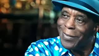 blues guitar great Buddy Guy gets interviewed  by Dan Rather