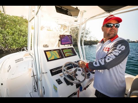 Jason Wilhelm's Edgewater 245CC with insane Simrad install.