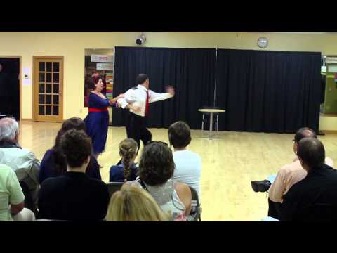 Mrs. Barbara Senzig and Mr. Nikolay dancing the Foxtrot at Spotlight Review