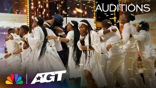 Mzansi Youth Choir reacts to their GOLDEN BUZZER moment! | AGT 2023 thumbnail