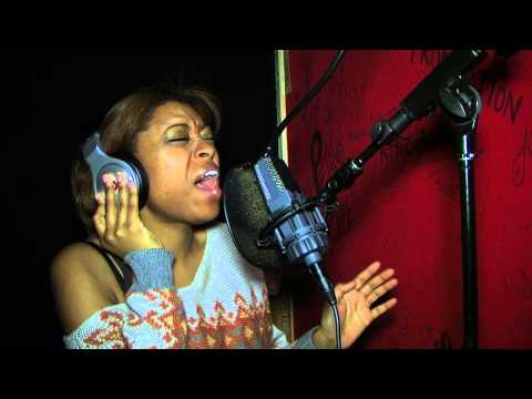 Seretha Lichez Guinn working on a new single in the studio.