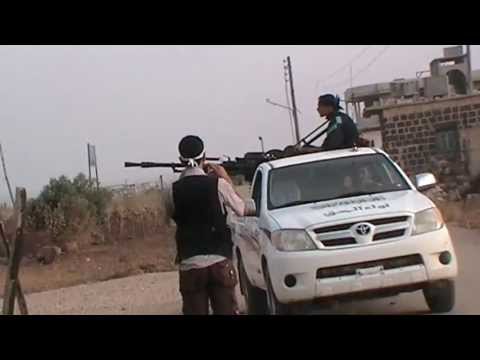 استهداف مبنى المطاحن برشاش 14.5 اثناء تقدم الثوار تجاه المربع الامني في ريف درعا