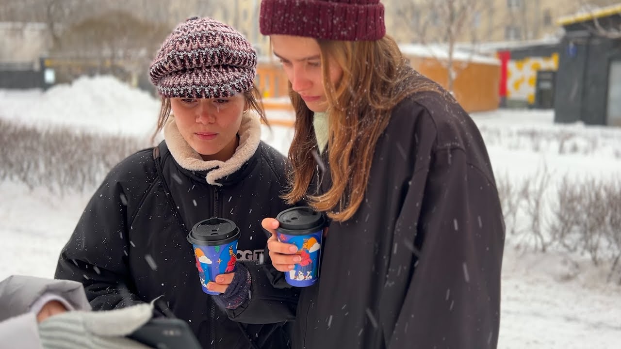 Russians look at pictures of destroyed Ukrainian city (Bakhmut)