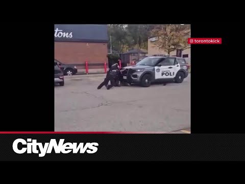 Video shows Toronto police SUV roll over suspect during Jane Park Plaza arrest