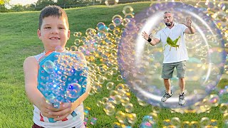 Download the video "CALEB's BUBBLE BLASTER BUG HUNT with MOM and DAD! BacKyard ADVENTURE OUTSIDE with New bubbles toy!"
