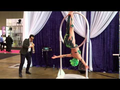 Cdn clarinet star Bob DeAngelis with aerialist @Cdn Special Events Expo