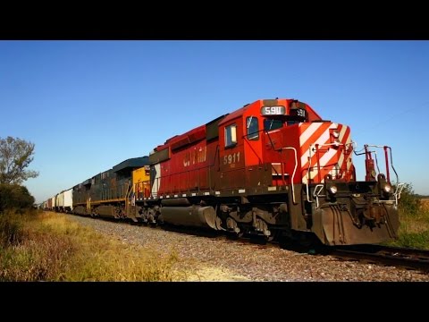 CP 5911, Large Multimark, with the 472 Train on 10/11/2014