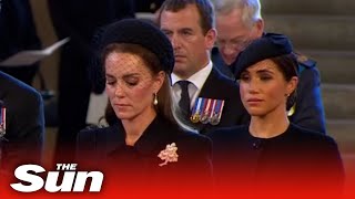 Kate and Meghan look sombre as they mourn The Queen in Westminster
