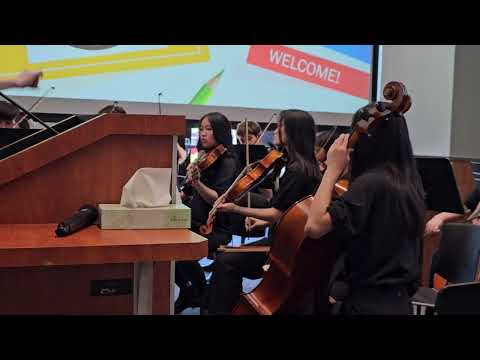 Shahala 8th grade orchestra at sub appreciation event: A river rhapsody by Richard meyer.