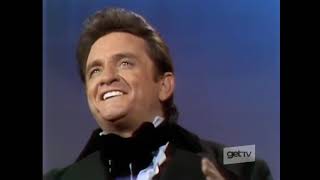 Johnny Cash and all guests sing "When The Saints Go Marching In"