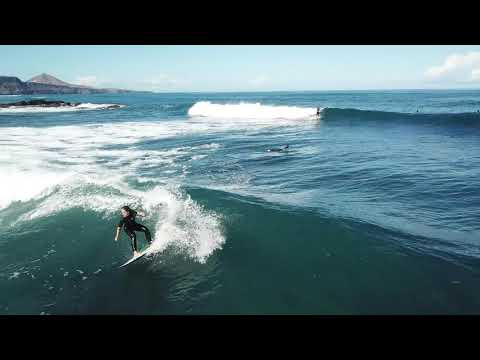 Drone view of solid waves and surfing at Quintanilla