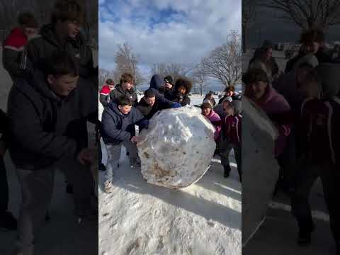 Giant Snow ball rolling down the hill!