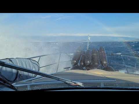 40 knots Bura and sunshine passing from Cres to Krk island Croatia. Strong wind