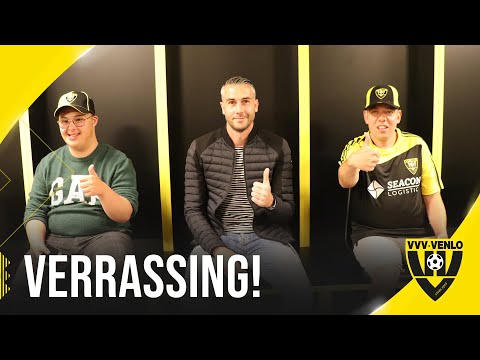 Kevin Begois verrast twee supporters