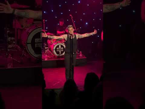 Dan Budd as Robbie Williams